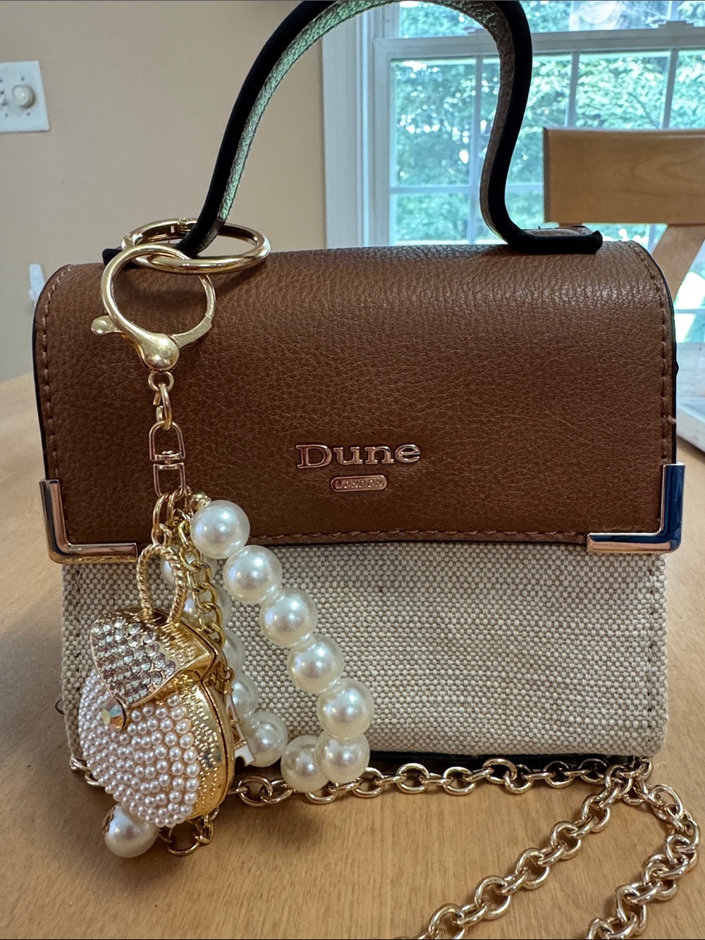 Dune London Mini Woven Top Handle Crossbody Bag with Pearl Charm